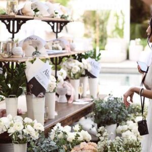 A Pinterest wedding trend, guests were enamored with the “build your own bouquet” flower cart.
